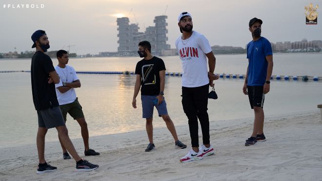 Royal Challengers Bangalore at Dubai beach enjoying the sunset